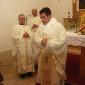 C2 Fr Anthony in Mass attire