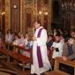 A3 Archpriest Mgr Carmelo Refalo holds the Gospel Book