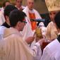 097 Bishop hands Chalice and Hosts to Fr Daniel