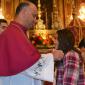 043 Candidate of Confirmation receives the Crucifix