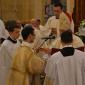 DSC_0100 Bishop hands the Gospel to the New Deacon