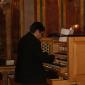 A5 Deacon Jos Curmi on the organ