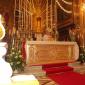 F3 Fr Sultana places the monstrance on the altar for adoration