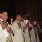 B8 Priests with lit candles