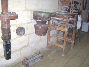 12 - spare parts of the windmill with rat trap on the floor